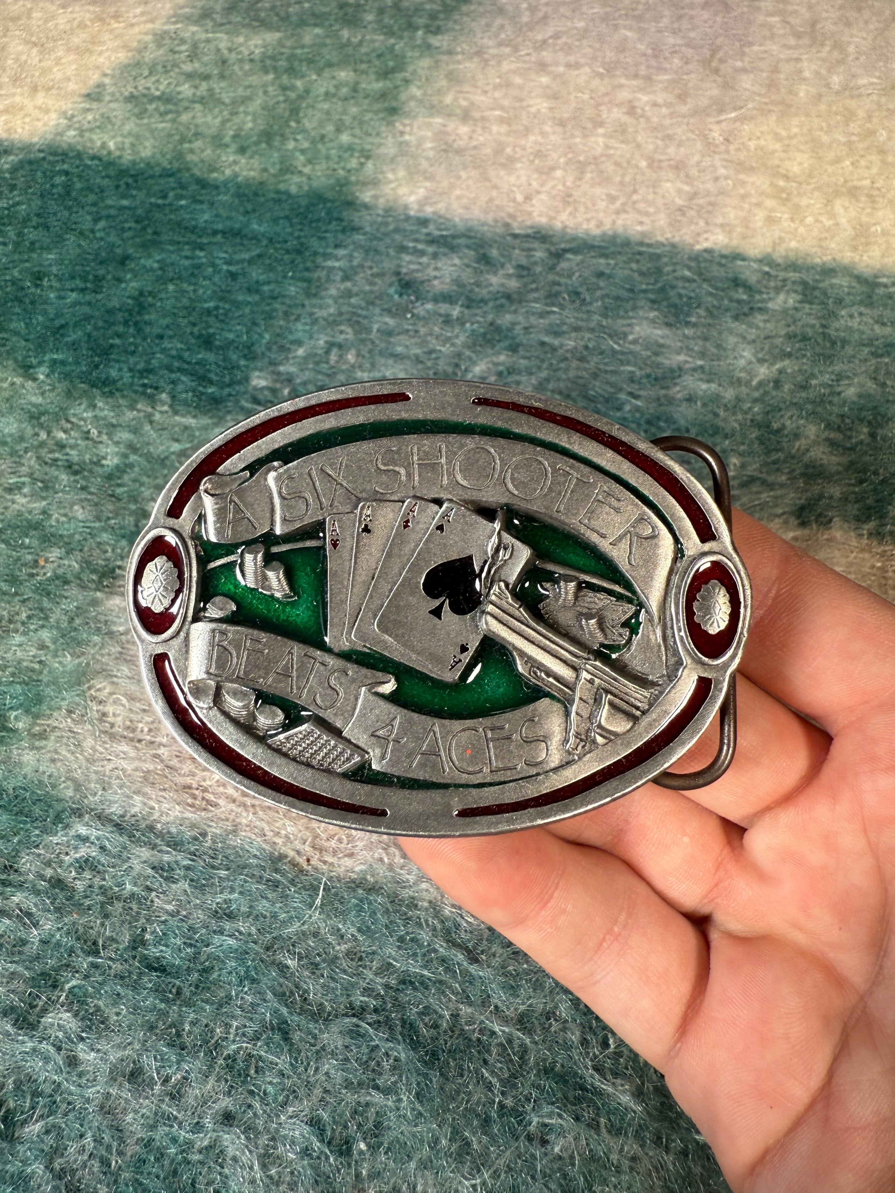 Vintage “A Six Shooter Beats 4 Aces” Belt Buckle