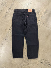Load image into Gallery viewer, Vintage Black Levi’s 550 Jeans (32x28)
